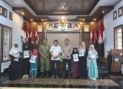 Polres Balangan Salurkan 50 Buah Alquran Ke Desa Suryatama